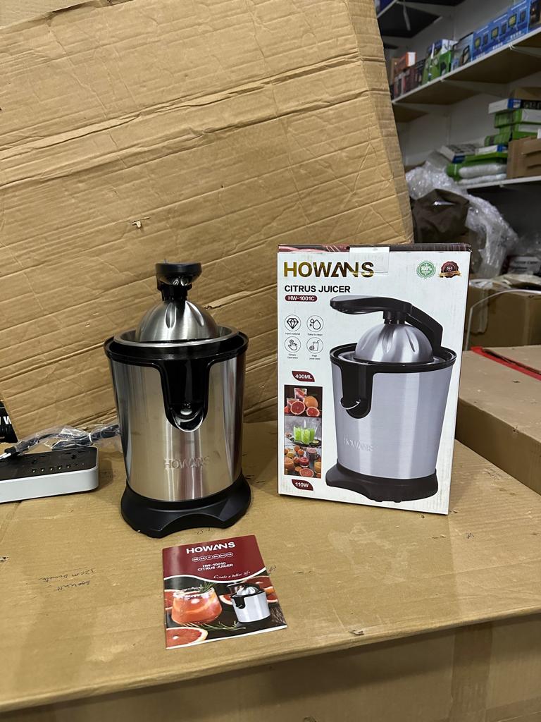 LOT IMPORTED HOWANS CITRUS JUICER