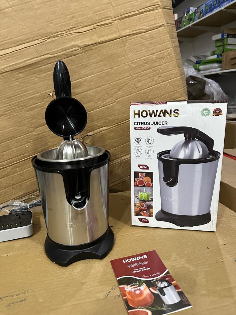 LOT IMPORTED HOWANS CITRUS JUICER